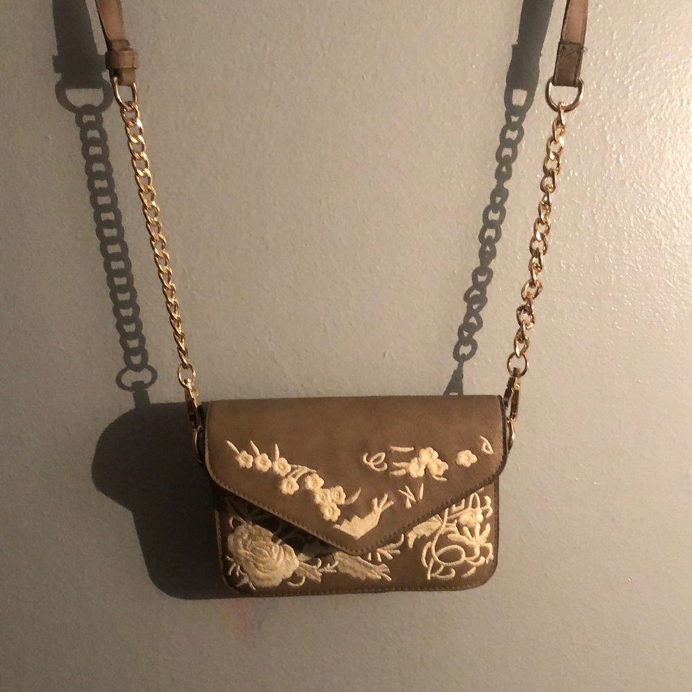 A small cross bony hand bag